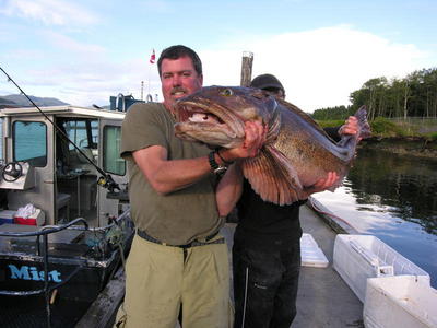 Captain with a 57lb Ling Cod