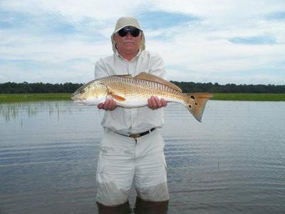 Tom Boyle shows off his first flood tide Red