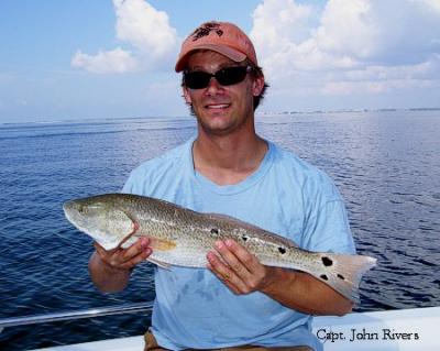 Brett was all smiles after he hooked-up on this keep Redfish.!