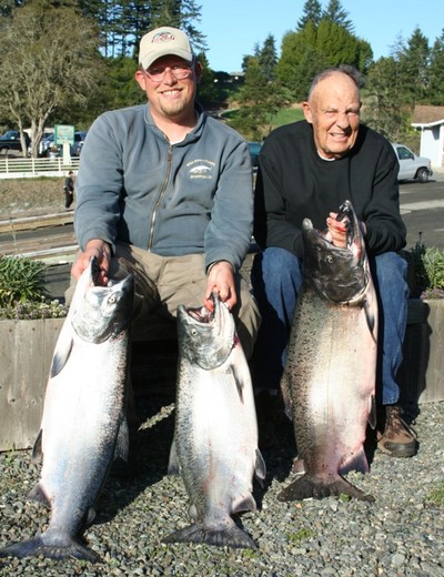 Guide Andy Martin and Phil Price with three chromer kings from the mouth of the Chetco.