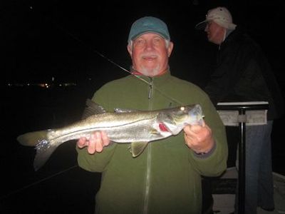 Anna Maria Island winter resident, Bill Morrison, with a snook caught and ereleased on a GRassett Snook Minnow fly while fishing the ICW near Venice with Capt. Rick Grassett.