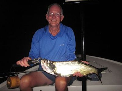Bob Delano, from Savannah, GA, with a tarpon caught and released on a Grassett Snook Minnow fly while fishing lighted docks in Sarasota Bay with Capt. Rick Grassett.