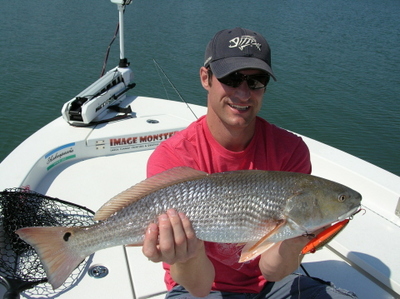 Kris with a nice grass Top-water Redfish