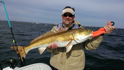 Kevin is all smiles after landing this big Pensacola Bay Redfish