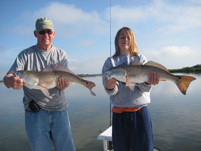 Grandson and Son Redfish Team