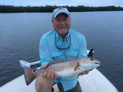Ron with a nice redfish caught on the flats of Fort Pierce