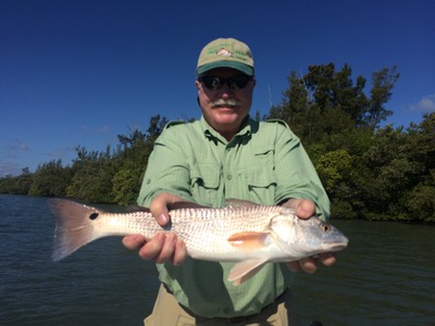 Duncan with a nice slot redfish from the mangroves in Fort Pierce
