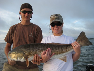 Kyla with her first ever redfish - Mosquito Lagoon Style!