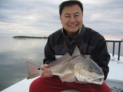 Ninh with one of his many redfish of the day.