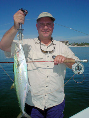 Kirk Grassett, from Middletown, DE, with a nice Spanish mackerel caught and released on a fly in the coastal gulf off Sarasota while fishing with Capt. Rick Grassett.
