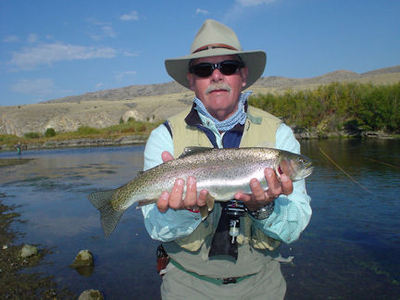 Mike Perez, from Richmond, IN, with a fat Beaverhead River rainbow trout caught on a dry fly.