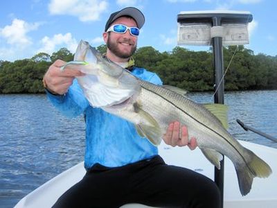Scott Heidler, from Hudson, OH, wth a Terra Ceia Bay big snook caught and released on a CAL jig with a shad tail while fishing with Capt. Rick Grassett.