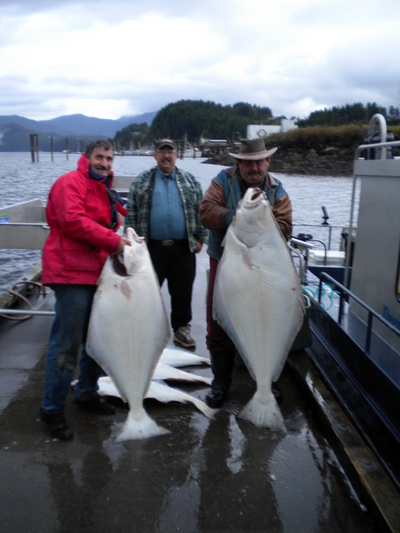 Rene and Kevin with two large Halibut