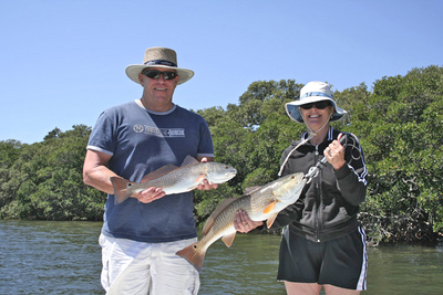 Doug and Trina with a couple of Redfish