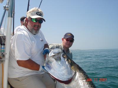 Aarron Remmor and Capt. Tom with a 200lb tarpon