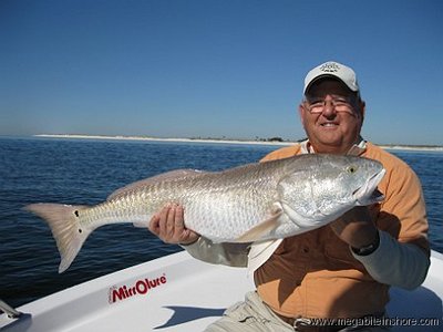 Larry had fun hooking reds all day.