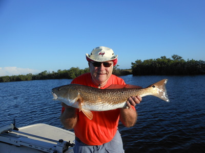 Fred with a big red fish