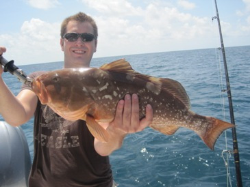 28-inch red grouper, caught on a pinfish