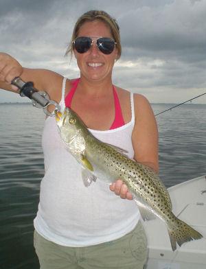 Sarah, from CO, caught and released this nice trout on a CAL jig with a shad tail while fishing Sarasota Bay with Capt. Rick Grassett.