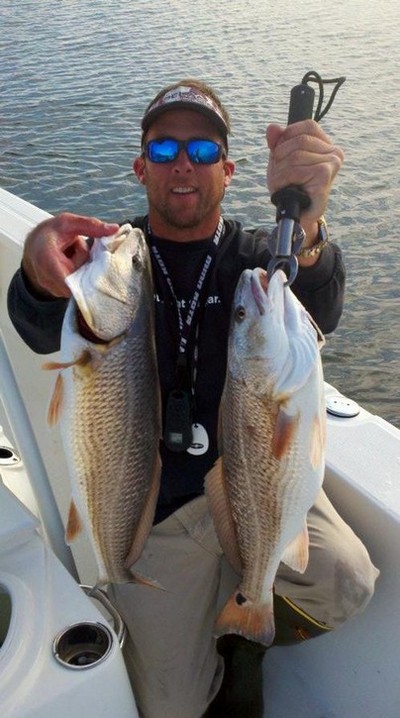 Captain Brandon Sauls with some nice inshore redfish caught this winter.