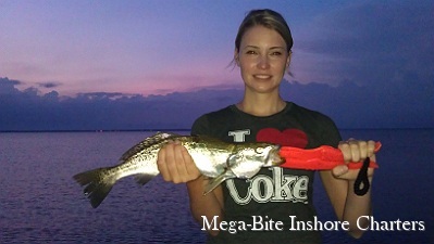 Emily is all smiles after landing this nice trout