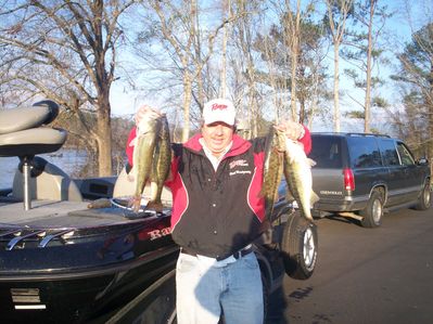 The Author with some nice spotted bass! Standing in Beezwax Creek Park, site of the 2010 Bassmaster Classic!