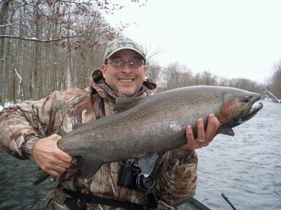 Me, holding another one of Doc's Steelhead.