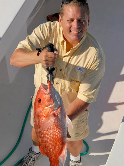 Capt Johnny Greene with a fine Red Snapper