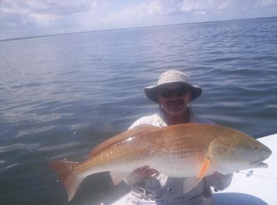 Captain Dave with a top water redfish.