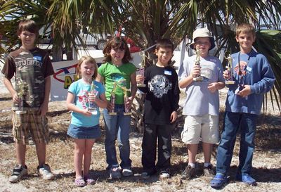 Trophy winners at a Junior Teen Anglers Fishing Tournament