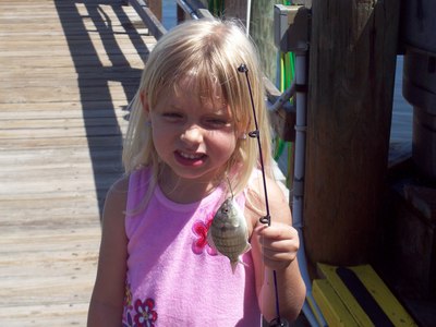 Kaitlyn Ward with one of the bait fish she caught.