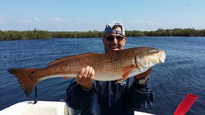 Ralph Pauly with a monster 33 inche red fish