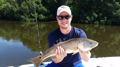 Ben is all smiles after landing this nice redfish