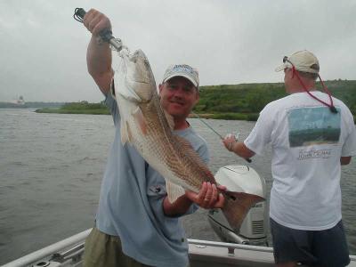 10 pound Redfish between the heavy rain on 6/21