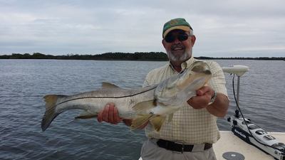 Derek with a monster 35 inche snook