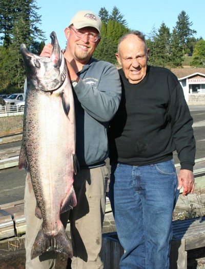 Guide Andy Martin of www.wildriversfishing.com holds a 40-pound king caught by Phil Price.