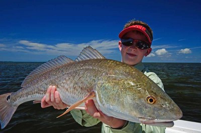 10 year old Aaron with a 29inch Redfish