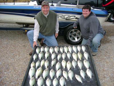 Here is a late fall trip with clients Barry and Adam Sunstrom from Milford Kansas on November 18th 2007 -  we had a great day on the water with 47 good keeper crappie  with around 60 crappie total caught. All these came from Spider Rigging channel ledges
