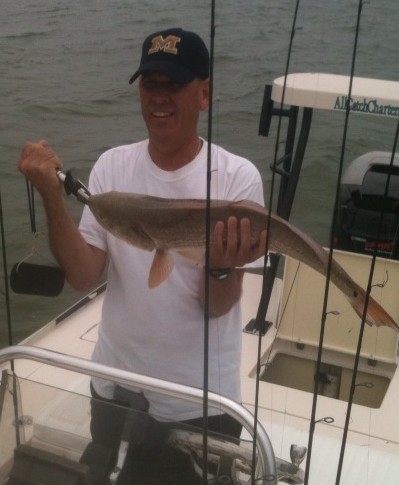 Bob with one of two redfish
