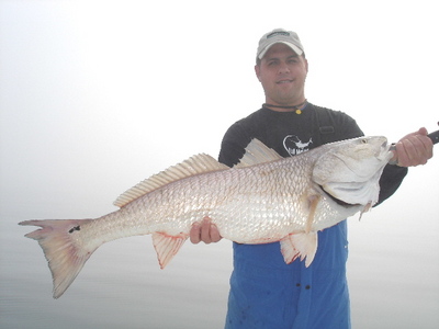 Matt Ledbetter with a sure enough Bull Red Fish!!