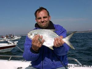 John with a Monster Pompano.