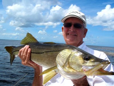 John Dewitt with a thirty inch snook caught and released from Charlotte Harbor on a live pilchard