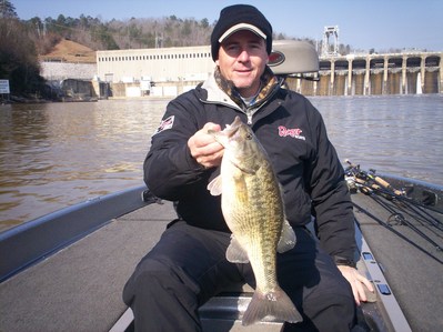 Fishing below the dam around rock bluffs, produced this fat, Coosa River Spotted Bass!