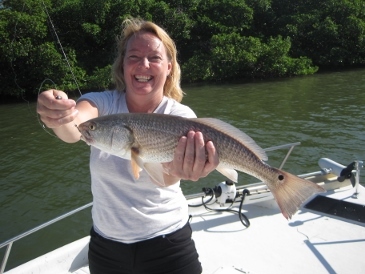 Karen Tirella with a 19-inch redfish, caught on shrimp in Estero Bay 9-15-16