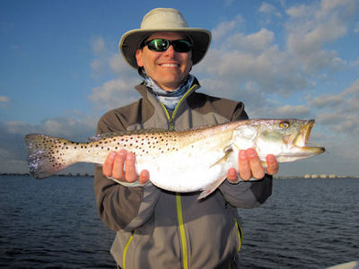 Kyle Ruffing's Sarasota Bay Grassett Flats Minnow fly 4-lb trout caught and released with Capt. Rick Grassett.