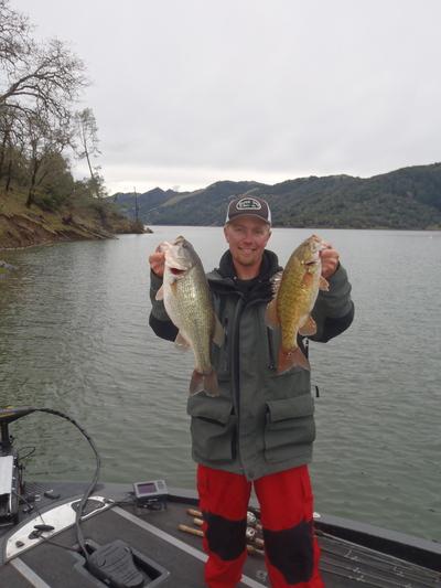Rus Snyders with a largemouth and smallmouth bass