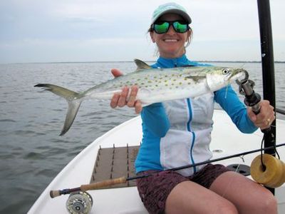 Lindsey Lewis, from CO, with a nice Spanish mackerel caught on an Ultra Hair Clouser fly while fishing Sarasota Bay with Capt. Rick Grassett.