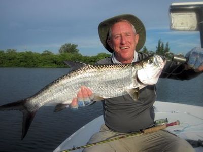 Marshall Dinerman, from Atlanta, GA, with a juvenile tarpon caught and released on a Grassett Flats Bunny fly in Sarasota while fishing with Capt. Rick Grassett.