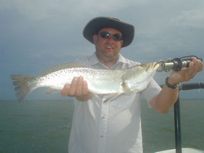Paul Browring, from the UK, with a big trout caught and released in Sarasota Bay while fishing with Capt. Rick Grassett.