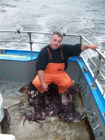 Capt Rob Yeoman with 3 of his 6 squid